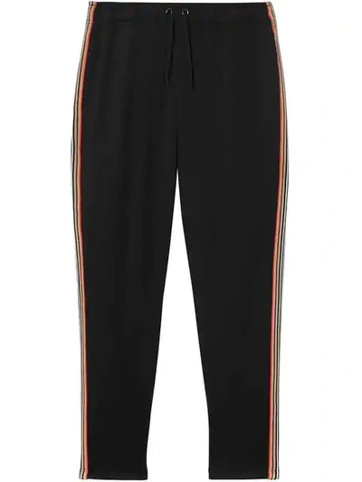 Shop Burberry Icon Stripe Detail Jersey Trackpants In Black