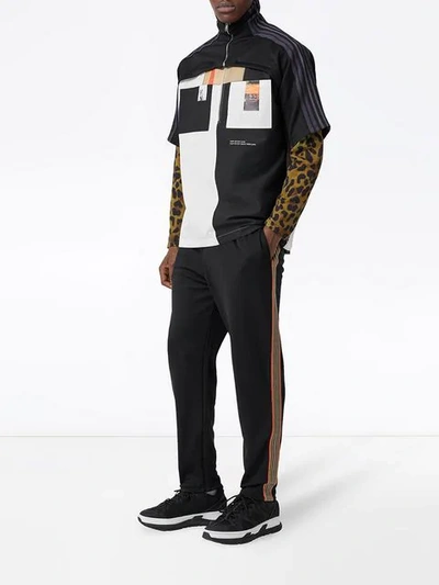 Shop Burberry Icon Stripe Detail Jersey Trackpants In Black