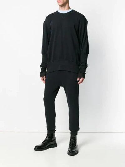 Shop Ann Demeulemeester Droped Crotch Track Trousers In Black