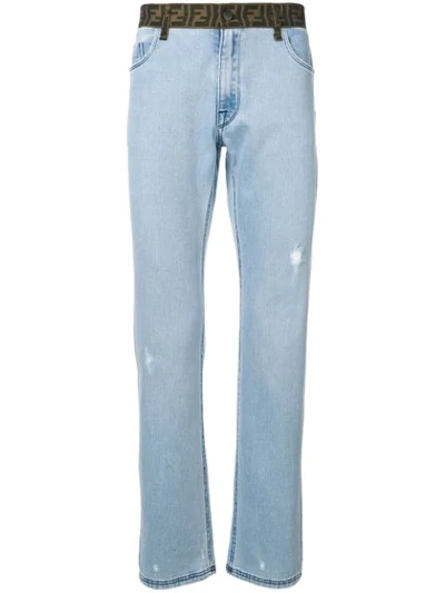 Shop Fendi Logo Banded Slim Jeans In Blue