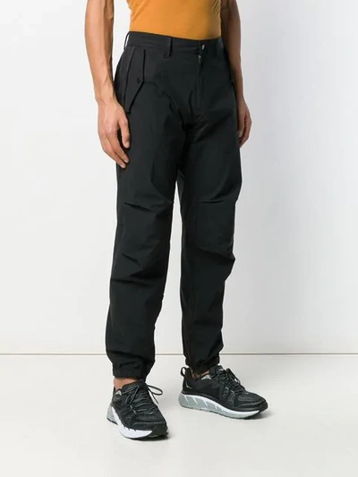 Shop Moncler Cargo Trousers In Black