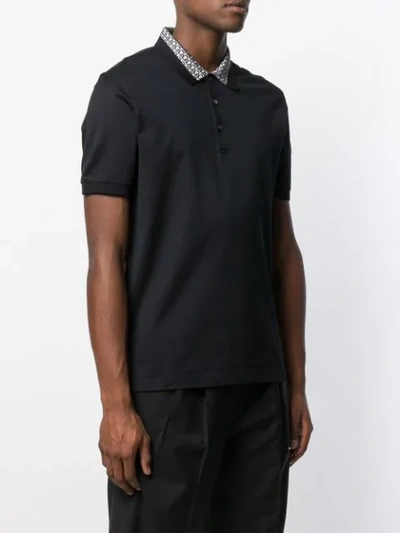Shop Ferragamo Patterned Collar Polo Shirt In Black