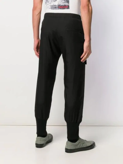 Shop Yohji Yamamoto Cargo Pocket Trousers In Black