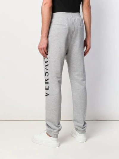 Shop Versace Slim Fit Jogging Trousers In Grey