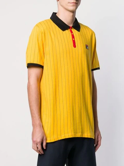 Shop Fila Poloshirt Mit Nadelstreifen In Yellow