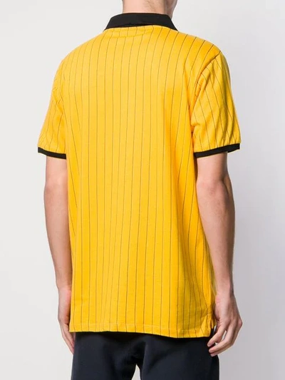 Shop Fila Poloshirt Mit Nadelstreifen In Yellow
