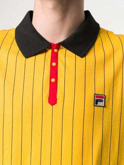 Shop Fila Poloshirt Mit Nadelstreifen In Yellow