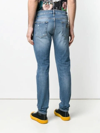 Shop Dolce & Gabbana Distressed Slim-fit Jeans In Blue