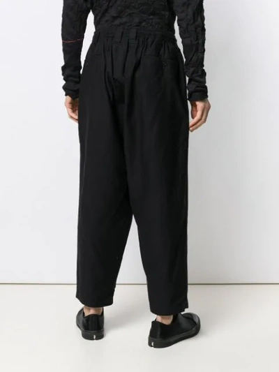 Shop Yohji Yamamoto Drop Crotch Trousers In Black