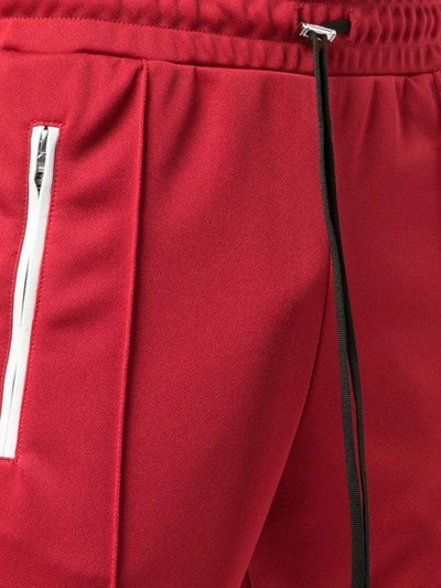 Shop Amiri Contrast Stripe Skinny Track Pants In Red