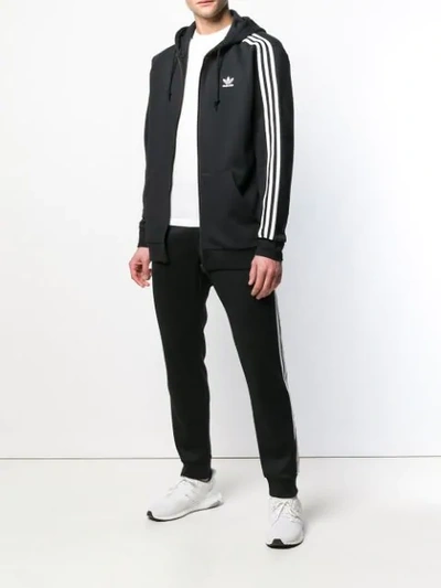 Shop Adidas Originals 3-stripes Zipped Hoodie In Black