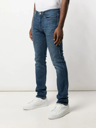Shop Frame Straight Leg Denim Jeans In Blue