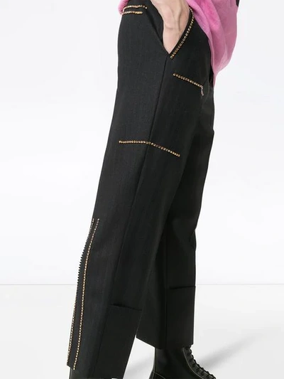 Shop Raf Simons Crystal Embellished Cropped Trousers - Black