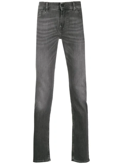 7 For All Mankind Tapered Stonewashed Jeans In Grey