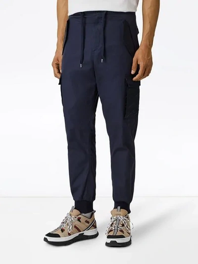 Shop Burberry Cotton Tapered Cargo Trousers In Blue