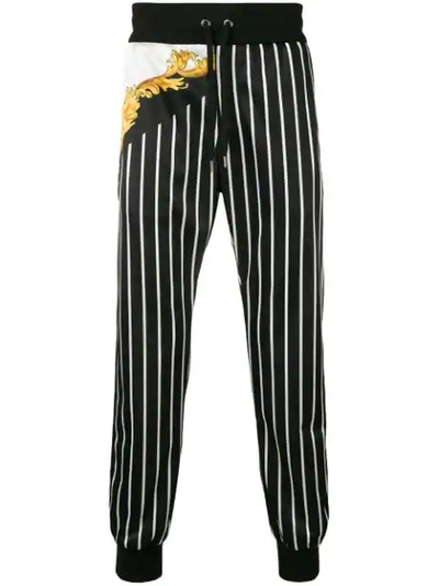 Shop Versace Striped Printed Track Trousers In Black