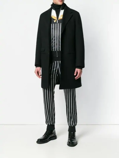 Shop Versace Striped Printed Track Trousers In Black