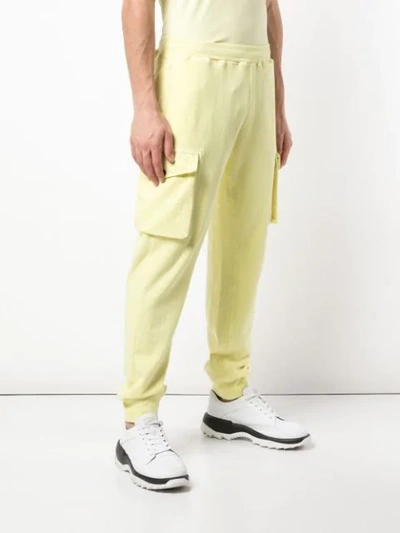 Shop Stone Island Logo Sweatpants In Yellow