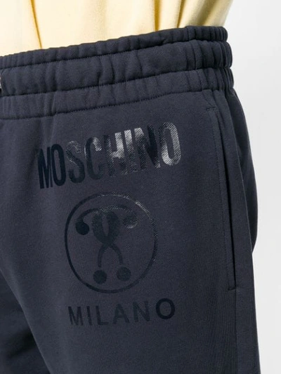 Shop Moschino Printed Track Pants In 0510 Blue