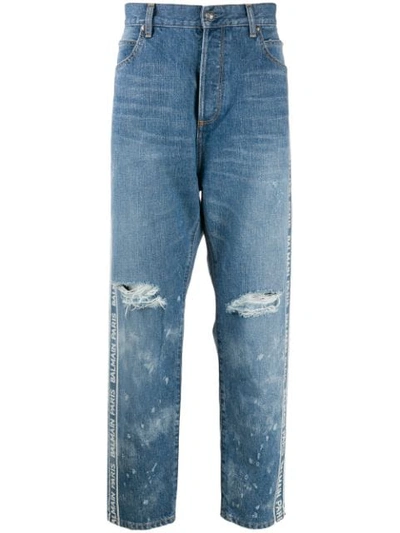 Shop Balmain Loose Fit Logo Jeans In Blue
