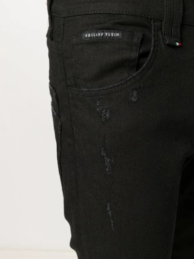 Shop Philipp Plein Slim Fit Jeans With Skull Print - Black