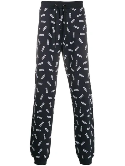 Shop Moschino Logo Print Track Pants In Blue