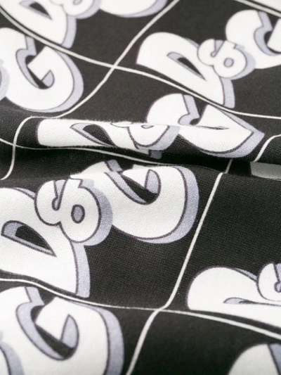 Shop Dolce & Gabbana All-over Logo Print T-shirt In Black