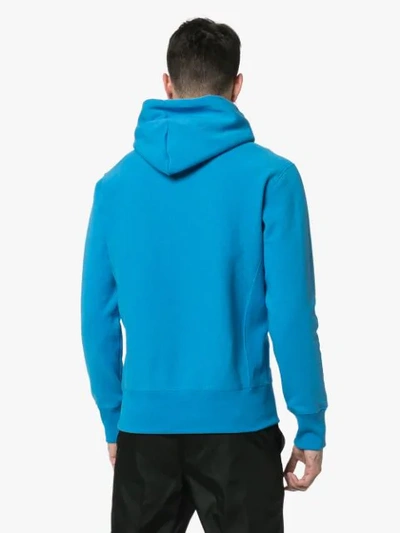 Shop Champion Logo Embroidered Hooded Cotton Jumper  In Blue