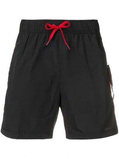Shop Tommy Hilfiger Side Stripe Swim Shorts - Black