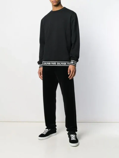 Shop Balmain Logo Printed Sweatshirt In Black