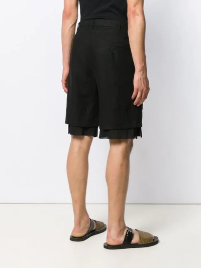 Shop Ann Demeulemeester Layered Hem Shorts - Black