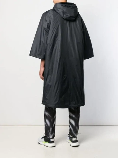 Shop Nike Raincoat In Black