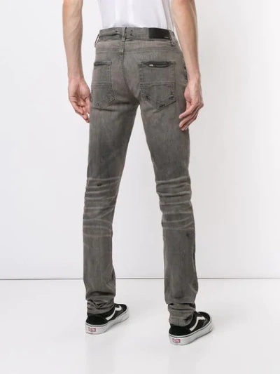 Shop Amiri Skinny-jeans In Distressed-optik - Grau In Grey