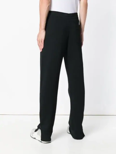 Shop Valentino Vltn Track Pants In Black