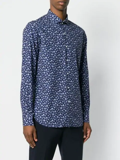 all-over patterned shirt