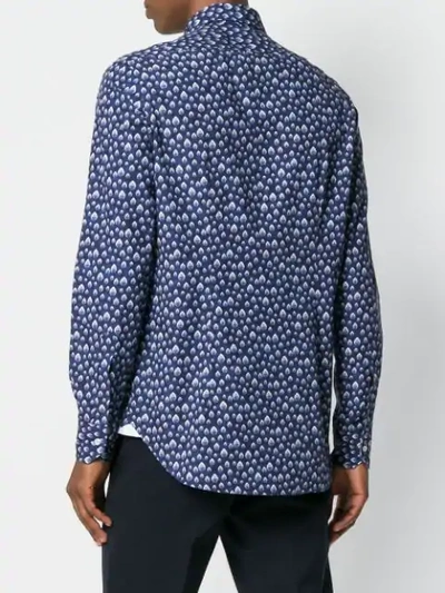 all-over patterned shirt