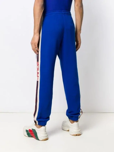 Shop Gucci Logo Stripe Joggers In Blue