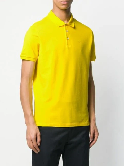 Shop Emporio Armani Geripptes Poloshirt In Yellow
