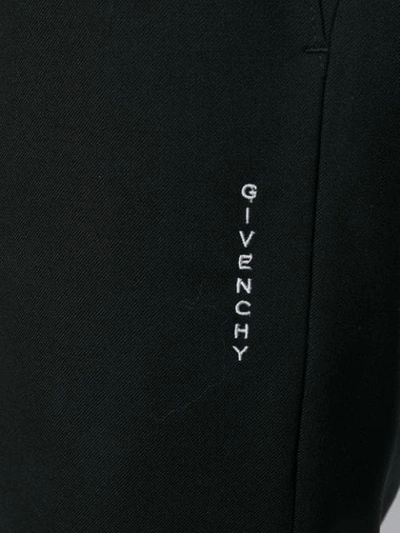 Shop Givenchy Vertical Logo Jogger Pants In Black