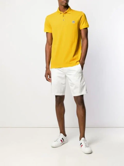 Shop Hugo Boss Boss  Poloshirt Mit Logo - Gelb In Yellow
