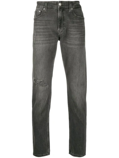 Shop Calvin Klein Jeans Est.1978 Faded Slim Fit Jeans In Black