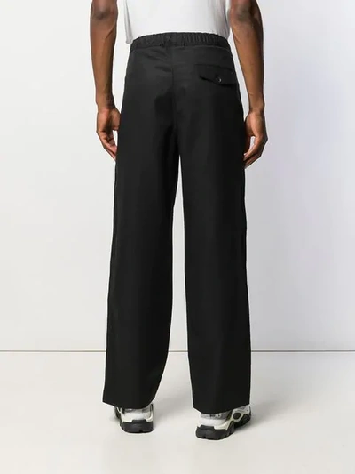 Shop Our Legacy Elasticated Trousers In Solid Black