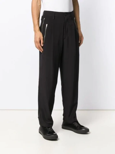 Shop Yohji Yamamoto Zipped Pocket Trousers In Black