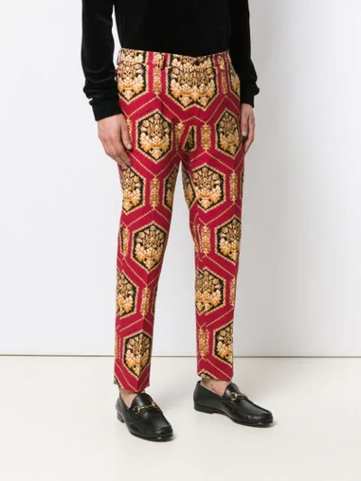 Shop Dolce & Gabbana Printed Trousers In Red