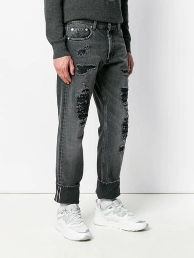 Shop Alexander Mcqueen Distressed Slim Jeans In 1001 Black Washed