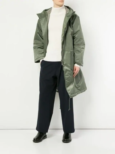 Shop Undercover Oversized Hooded Parka In Green