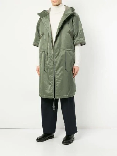 Shop Undercover Oversized Hooded Parka In Green