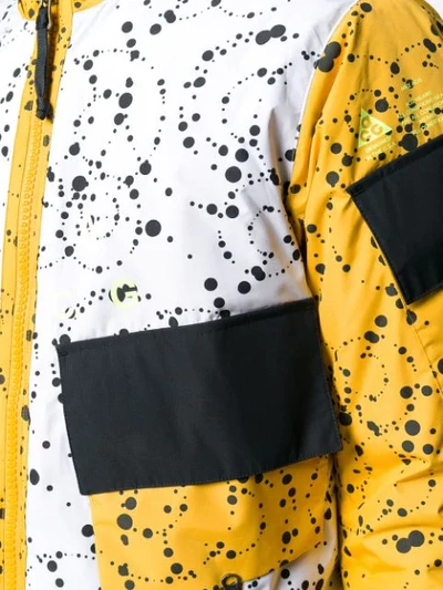 Shop Nike Dotted Jacket In Yellow