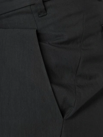 Shop Julius Loose Fit Wrap Trousers In Black