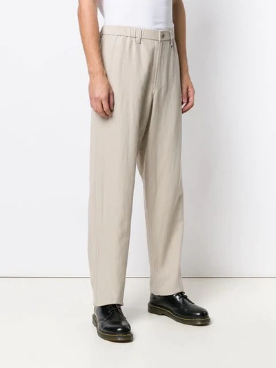 Shop Issey Miyake Formal Loose Fit Trousers In Neutrals